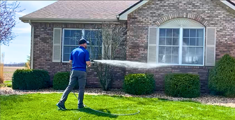 Soft washing house exteriors